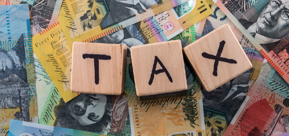 What are the tax implications for different business structures?